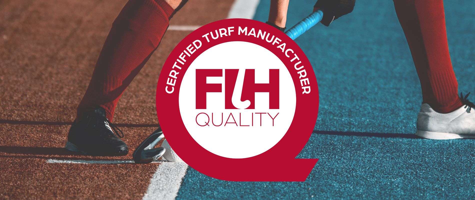 International Hockey Federation FIH Quality Programme logo on hockey turf