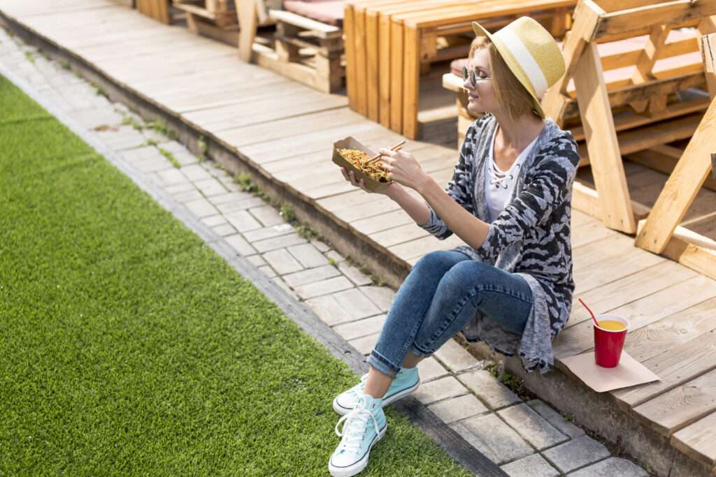 high view shot woman holding chinese food